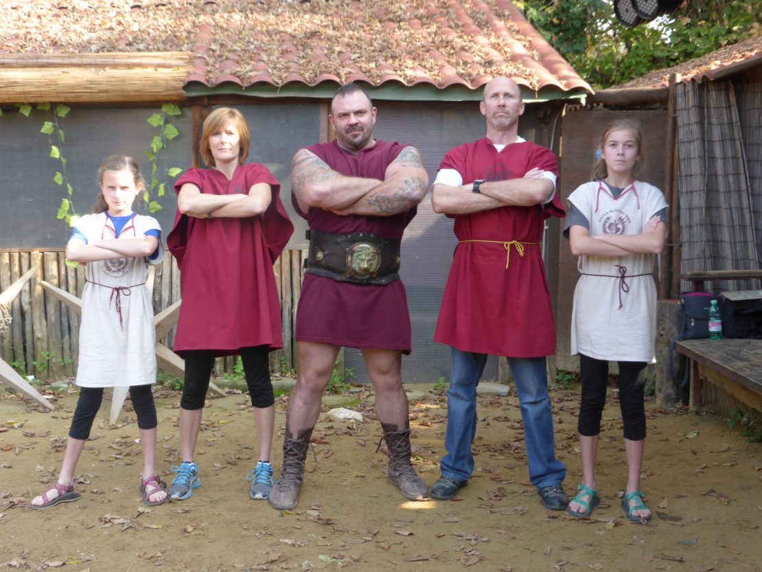 Family stands with Gladiator after lessons