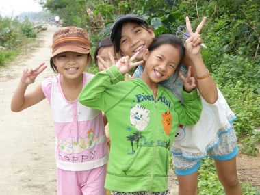 Four smiling Vietnamese girls