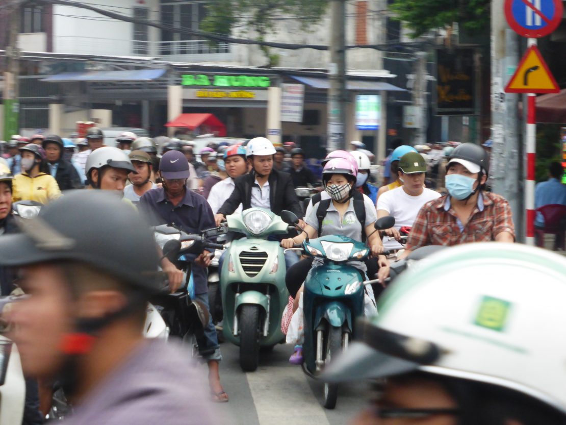 How to cross a street in Vietnam and survive! - GRRRLTRAVELER
