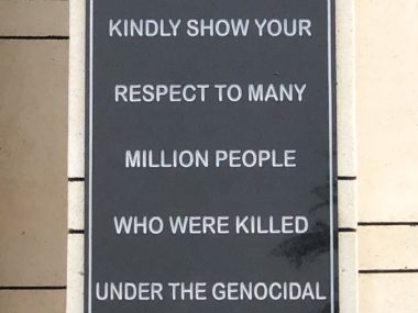 Killing Fields memorial sign: would you please kindly show your respect to the many million people who were killed under the genocidal pol pot regime